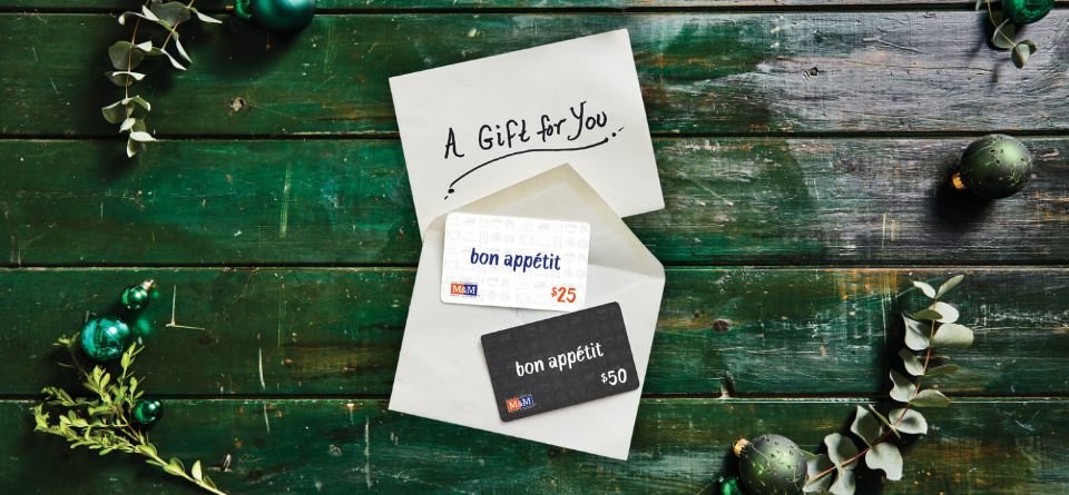 An M&M Food Market gift card on a table