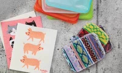A kitchen counter full of serving accessories and utensils.