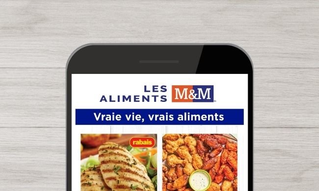 Page couverture d'une circulaire Les Aliments M&M, tel que vue à l'écran d'un cellulaire